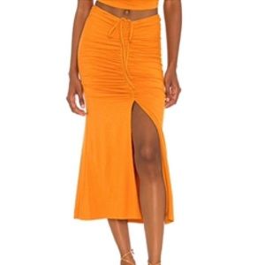 House of Harlow x Sophia Richie Sunnie Midi Skirt in Burnt Orange. Size Small.